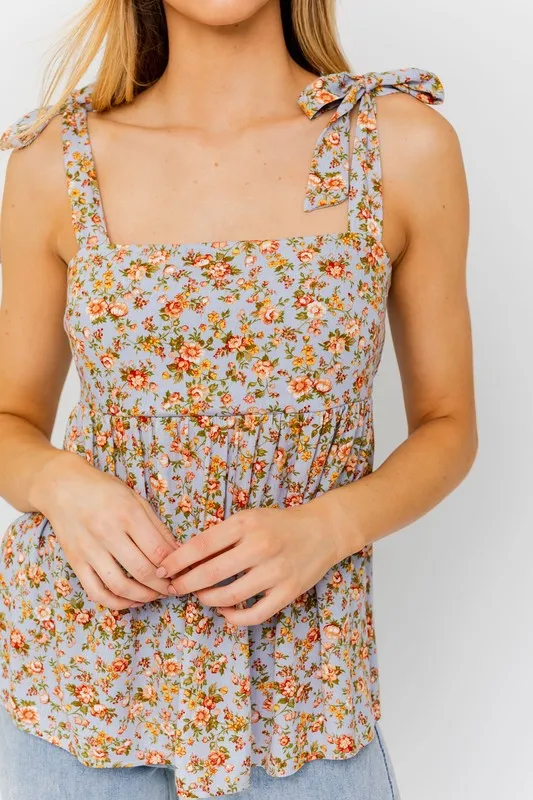 FLORAL SLEEVELESS RUFFLE BOTTOM TOP