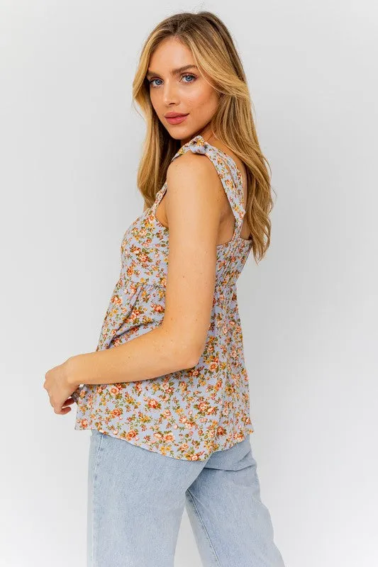 FLORAL SLEEVELESS RUFFLE BOTTOM TOP