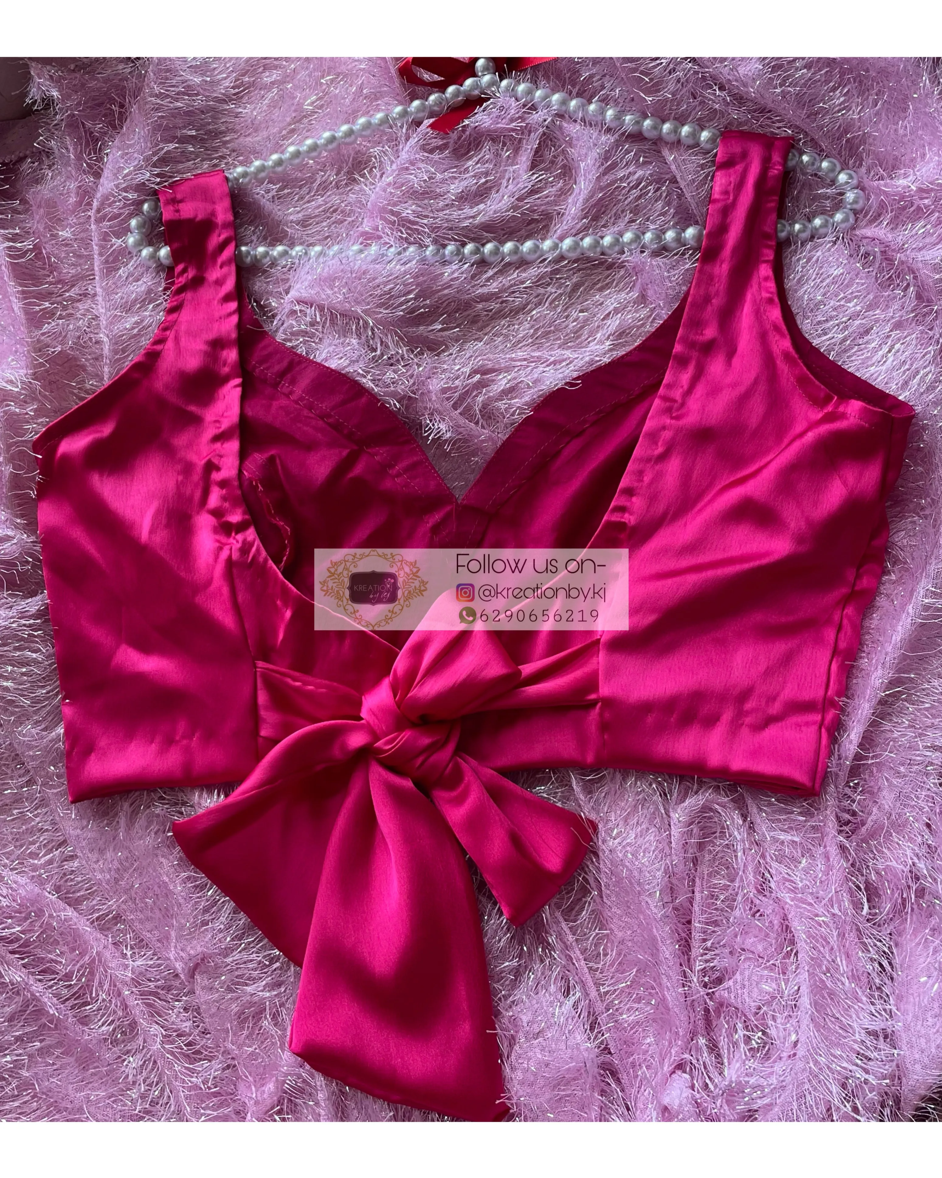 Hot Pink Sleeveless Blouse